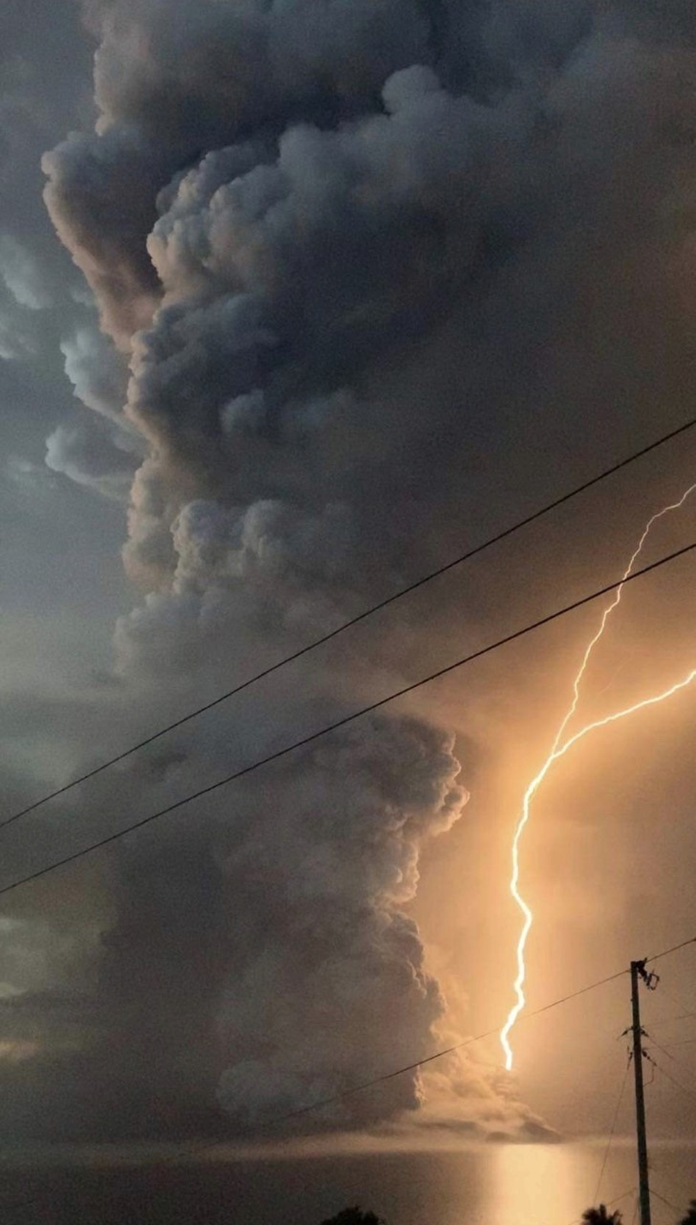 Lightning strike in the midst of Taal volcano explosion is seen in Lipa City  / CHESLIE ANDAL