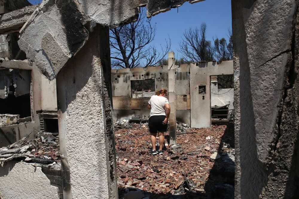 Wildfires hit Attica, Greece  / ORESTIS PANAGIOTOU