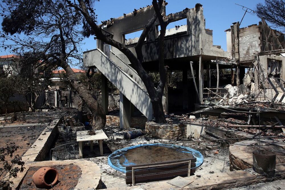 Wildfires hit Attica, Greece  / ORESTIS PANAGIOTOU